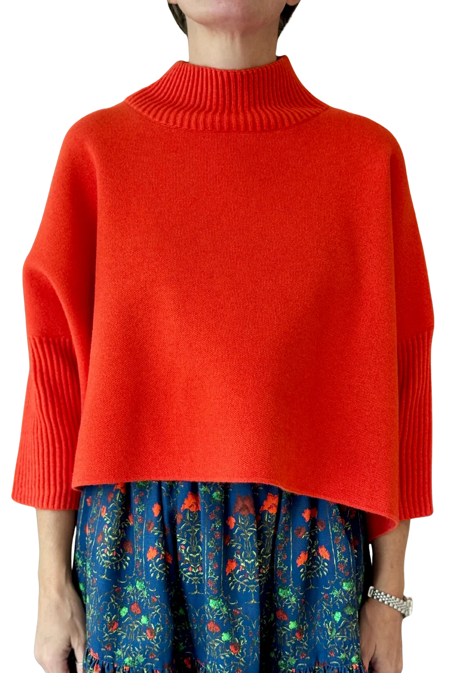 Woman in a mock neck 3/4 sleeve orange sweater